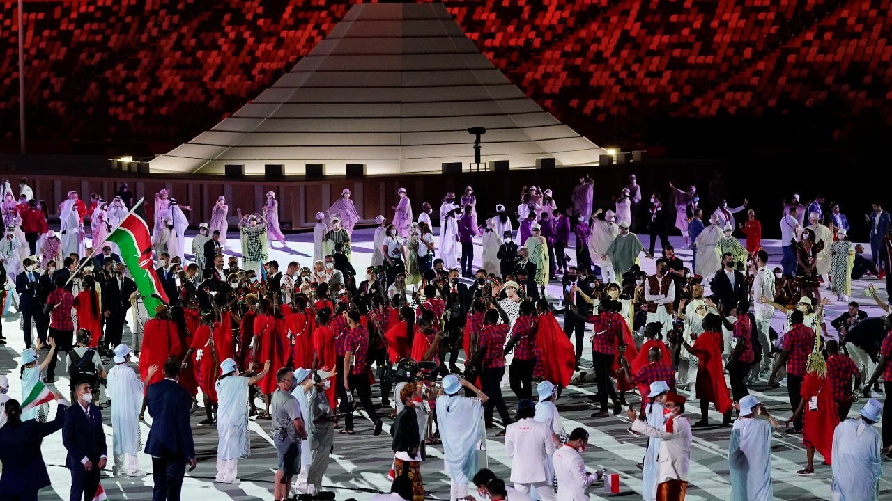 Kenyan athletes march into the stadium during the opening ceremony in the Olympic Stadium at the 2020 Summer Olympics in Tokyo, Japan. (Image: AP)