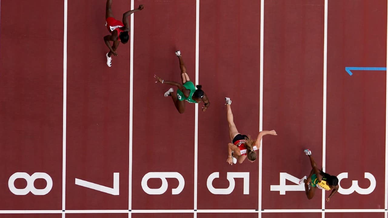 Shelly-Ann Fraser-Pryce, of Jamaica, Ajla Del Ponte, of Switzerland, Nzubechi Nwokocha, of Nigeria, and Gina Bass, of Gambia, compete during the first round of the women's 100-meter the 2020 Summer Olympics, July 30, in Tokyo. (Image: AP)
