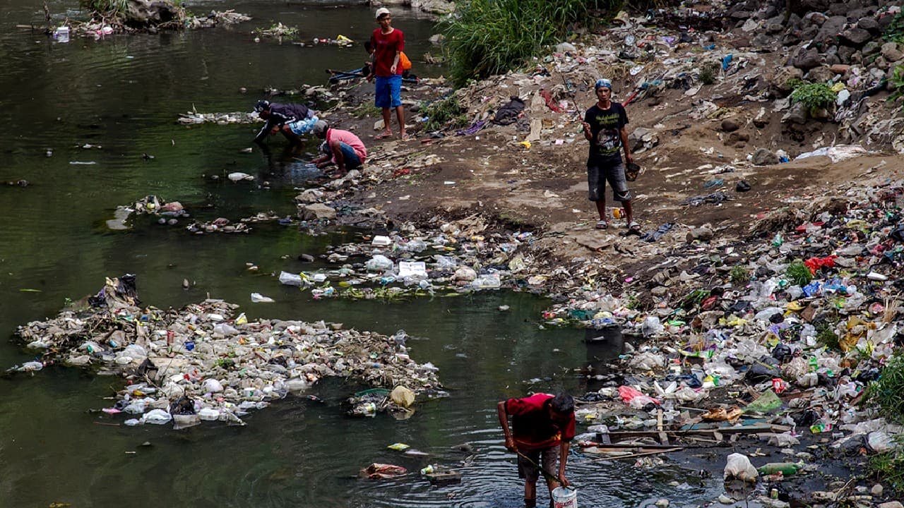 Fishing in the Brantas river of the East Java province, Indonesia, means going through loads of plastic trash, discarded by the residents of thousands of buildings. (Image: Fully Syafi Handoko (Indonesia) via UN) Fishing in the Brantas river of the East Java province, Indonesia, means going through loads of plastic trash, discarded by the residents of thousands of buildings. (Image: Fully Syafi Handoko (Indonesia) via UN)