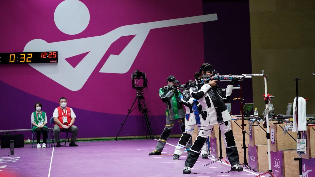 Divyansh Singh Panwar, of India, right, practices at the Asaka Shooting Range ahead of the 2020 Summer Olympics on July 22, in Tokyo, Japan. (Image: AP) Divyansh Singh Panwar, of India, right, practices at the Asaka Shooting Range ahead of the 2020 Summer Olympics on July 22, in Tokyo, Japan. (Image: AP)