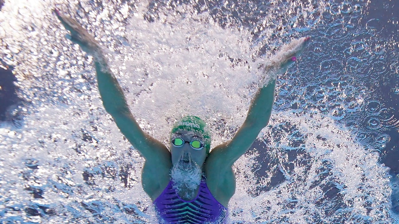 Or the popping lat muscles that propel Tatjana Schoenmaker’s breaststroke, taken days before the South African set a world record in the 200-meter. (Image: AP)