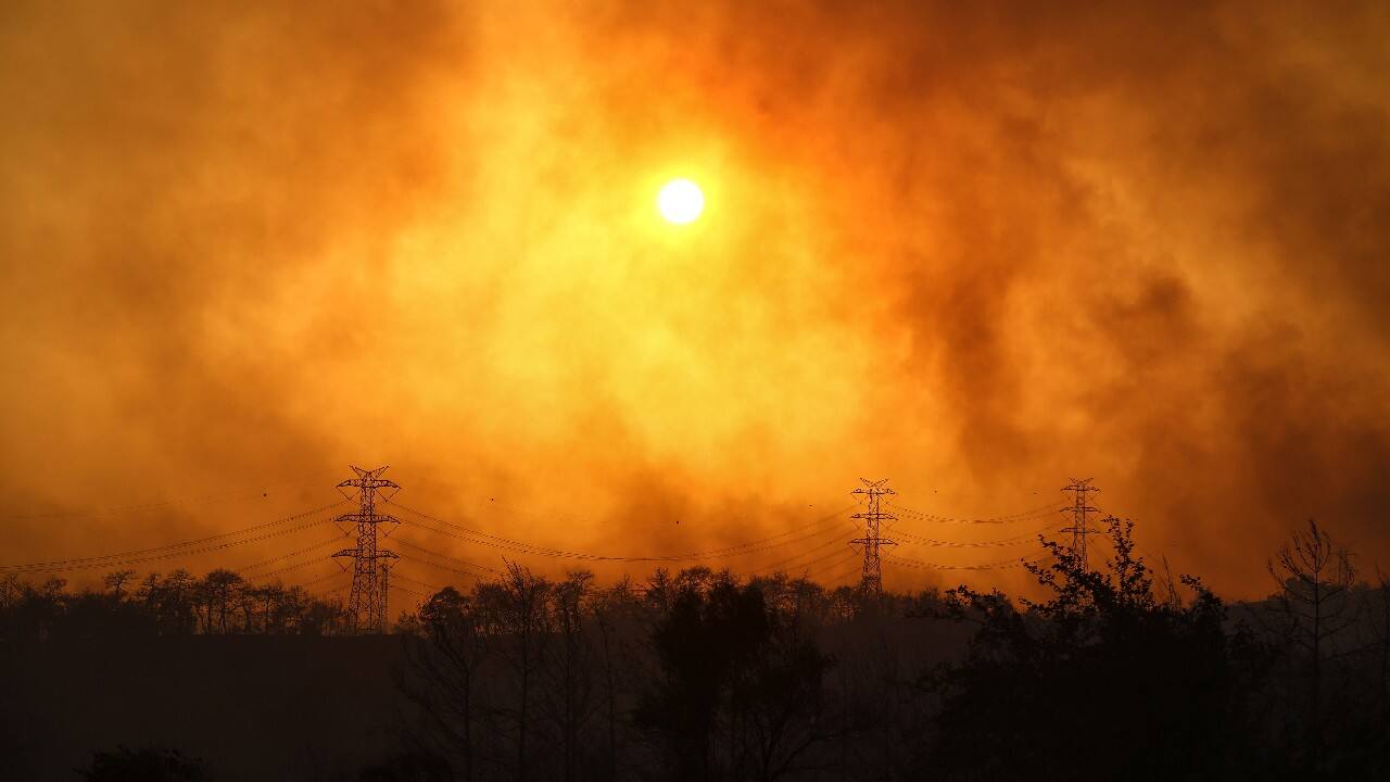Footage showed plumes of black smoke rising from the forest around Manavgat, 75 km (45 miles) east of the resort city of Antalya, and Mayor Sukru Sozen said flames had spread as far as the town centre, where many buildings were being evacuated. (Image: Reuters) Footage showed plumes of black smoke rising from the forest around Manavgat, 75 km (45 miles) east of the resort city of Antalya, and Mayor Sukru Sozen said flames had spread as far as the town centre, where many buildings were being evacuated. (Image: Reuters)