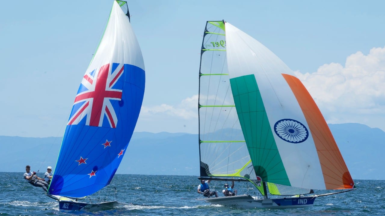 New Zealand, left, and India teams of the men's 49er men class sail in the Enoshima Yacht Harbour during a training session on the occasion of at the 2020 Summer Olympics, July 22, in Fujisawa, Japan. (Image: AP) New Zealand, left, and India teams of the men's 49er men class sail in the Enoshima Yacht Harbour during a training session on the occasion of at the 2020 Summer Olympics, July 22, in Fujisawa, Japan. (Image: AP)