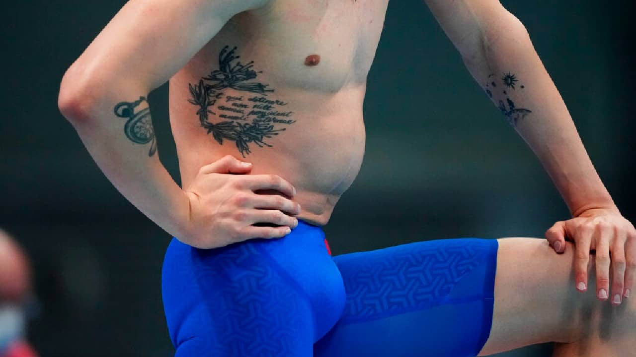 No such restrictions in the Olympic bubble, though. In the pool, on the beach, at the range — the athletes are redefining what it means to have the mark of a champion. (Image: AP)