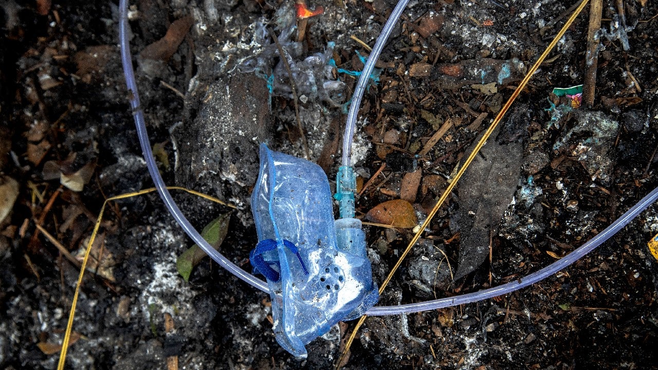 India’s devastating virus surge in April and May left families and patients pleading for oxygen outside hospitals, the relatives weeping in the street as their loved ones died while waiting for treatment. Crematoriums were overwhelmed and often lit around the clock. (Image: AP) India’s devastating virus surge in April and May left families and patients pleading for oxygen outside hospitals, the relatives weeping in the street as their loved ones died while waiting for treatment. Crematoriums were overwhelmed and often lit around the clock. (Image: AP)
