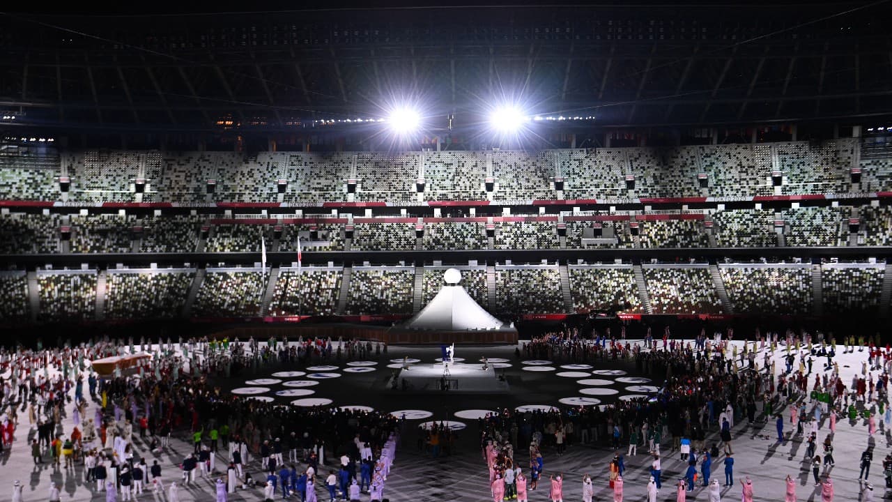 Actors, center, perform during the opening ceremony in the Olympic Stadium at the 2020 Summer Olympics. (Image: AP)