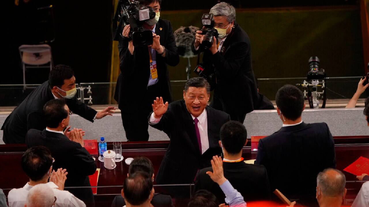Chinese President Xi Jinping, center, waves above a large portrait of the late leader Mao Zedong during a ceremony to mark the 100th anniversary of the founding of the ruling Chinese Communist Party at Tiananmen Gate in Beijing, July 1. (Image: AP/Ng Han Guan) Chinese President Xi Jinping, center, waves above a large portrait of the late leader Mao Zedong during a ceremony to mark the 100th anniversary of the founding of the ruling Chinese Communist Party at Tiananmen Gate in Beijing, July 1. (Image: AP/Ng Han Guan)