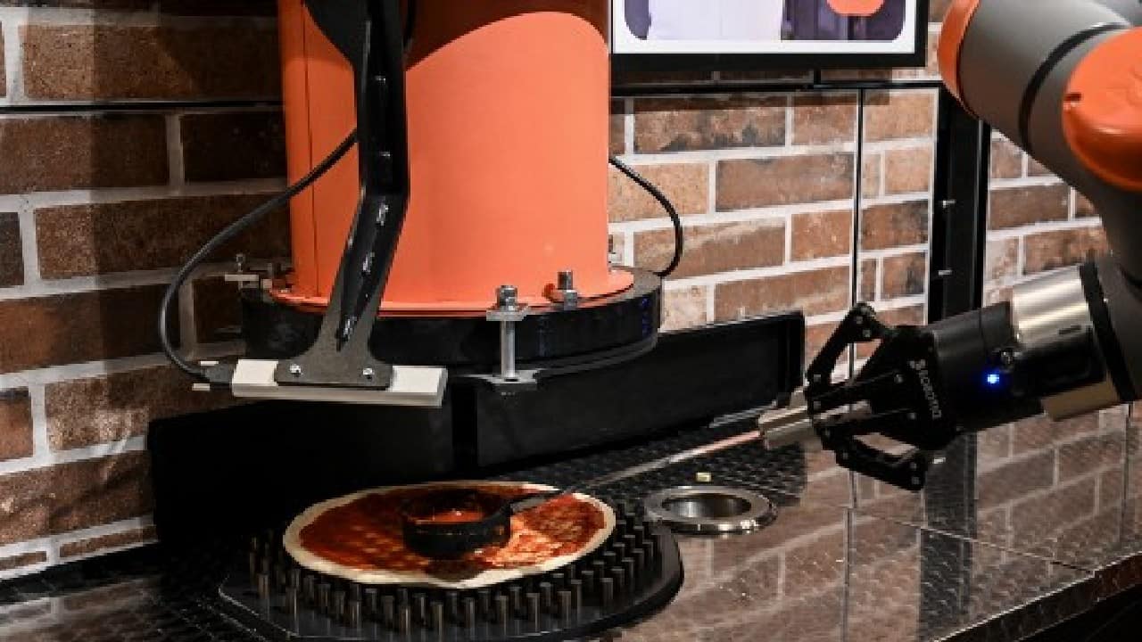 Roverso and a fellow engineer and inventor, Cyrill Hamon, launched their adventure eight years ago in a family garage, securing millions of euros from venture funds including the state-owned development bank, Bpifrance. After a first restaurant in a Paris suburb in 2019, the company has its sights on an international chain where employees would focus solely on customer service or table cleanup. (Image: AFP)