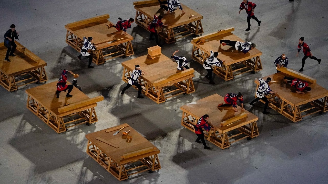 ASctors perform during the opening ceremony at the Olympic Stadium at the 2020 Summer Olympics, Friday, July 23, 2021, in Tokyo.