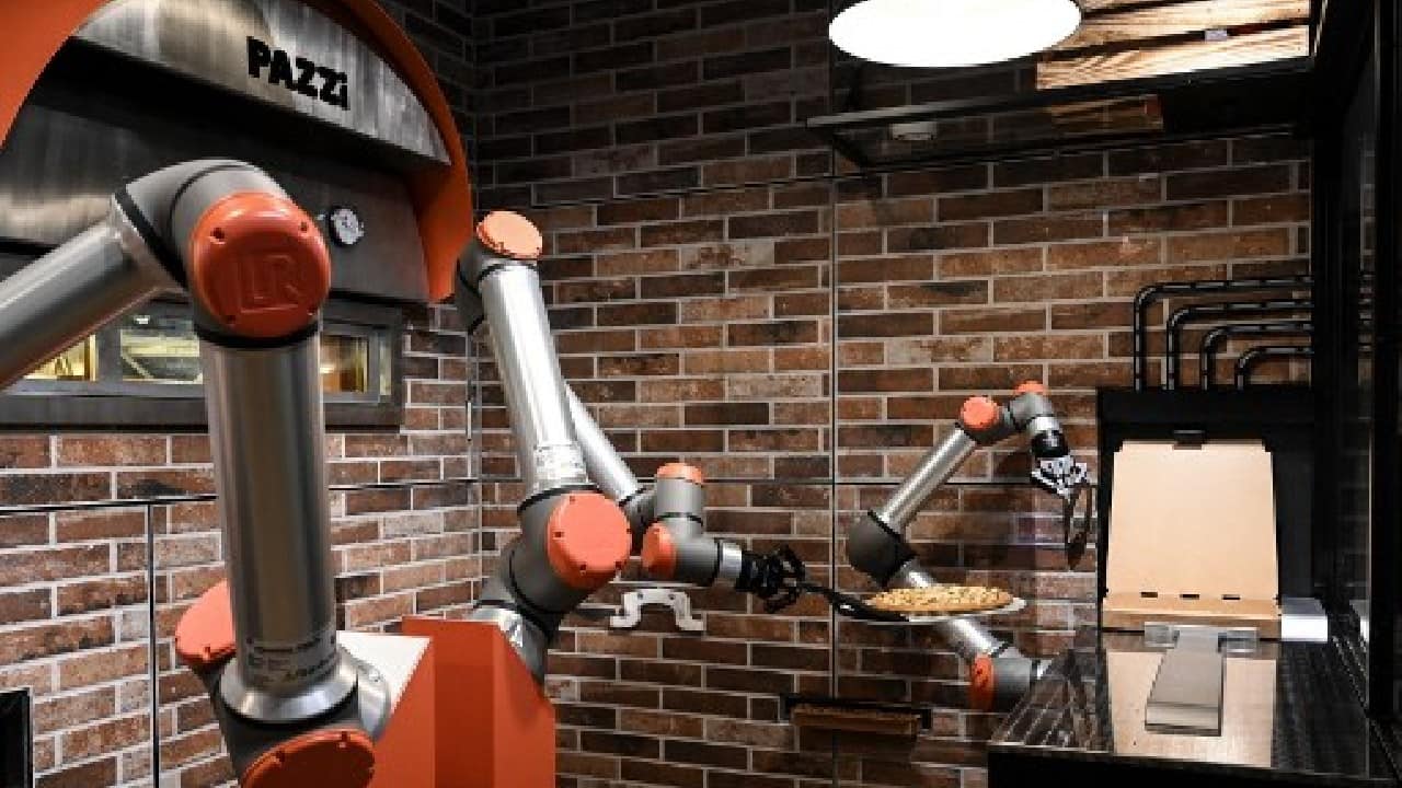 The Pazzi robots are almost completely autonomous and in theory won't be susceptible to breakdowns. The tricky part was dealing with fresh dough, since using frozen products was out of the question. (Image: AFP)
