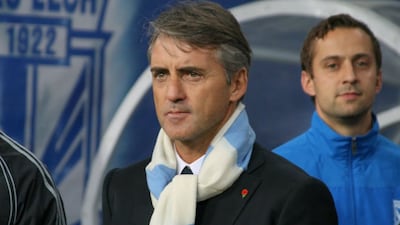 Ex-Man City manager Roberto Mancini appears to acknowledge a 'double contract' with the club