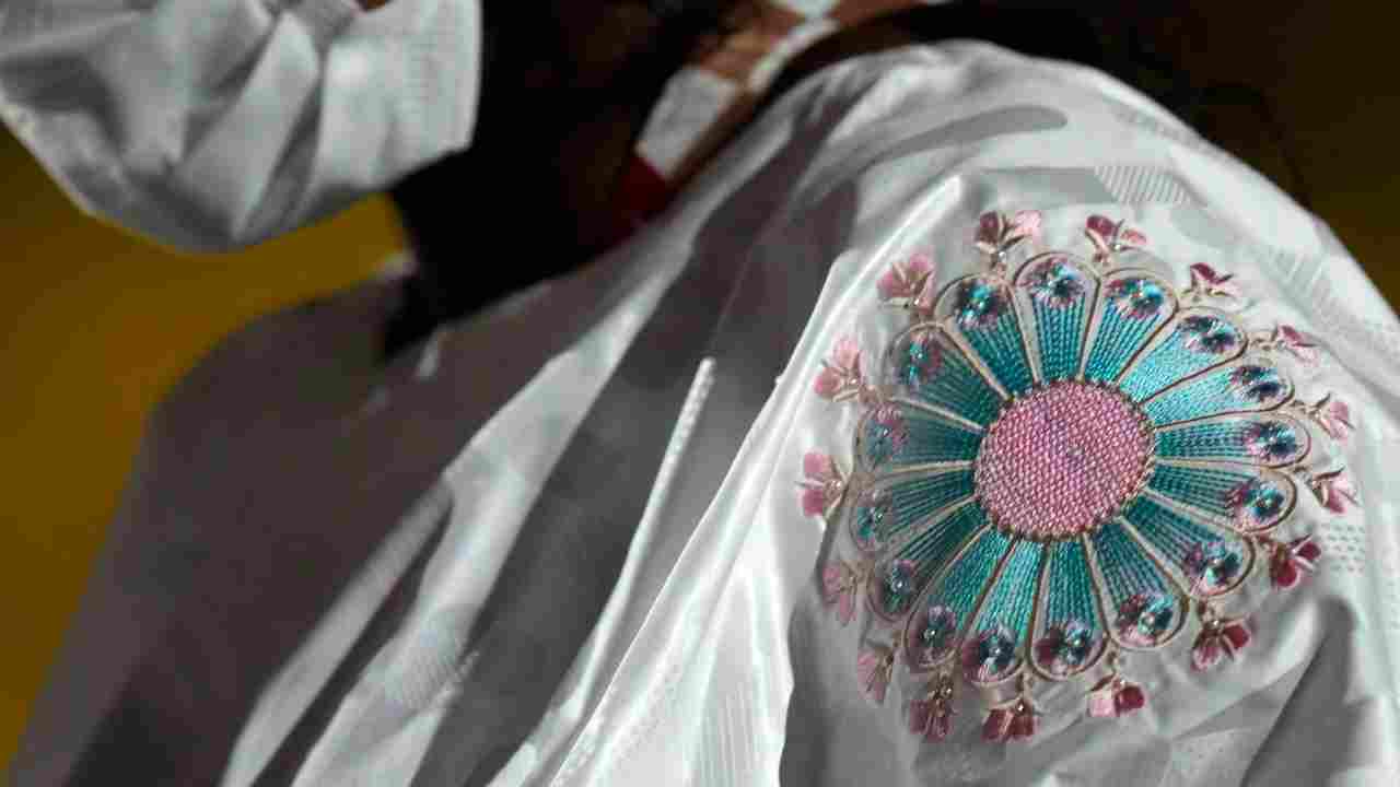 A team member of Gambia walks during the opening ceremony in the Olympic Stadium at the 2020 Summer Olympics. (Image: AP)