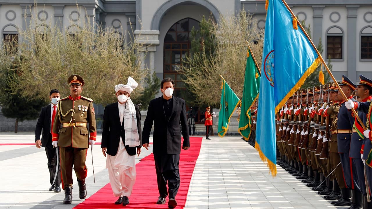 Afghan President Ashraf Ghani and Pakistani Prime Minister Imran Khan inspect the honour guard at the presidential palace in Kabul, Afghanistan on November 19, 2020 (Image: Reuters/Mohammad Ismail)