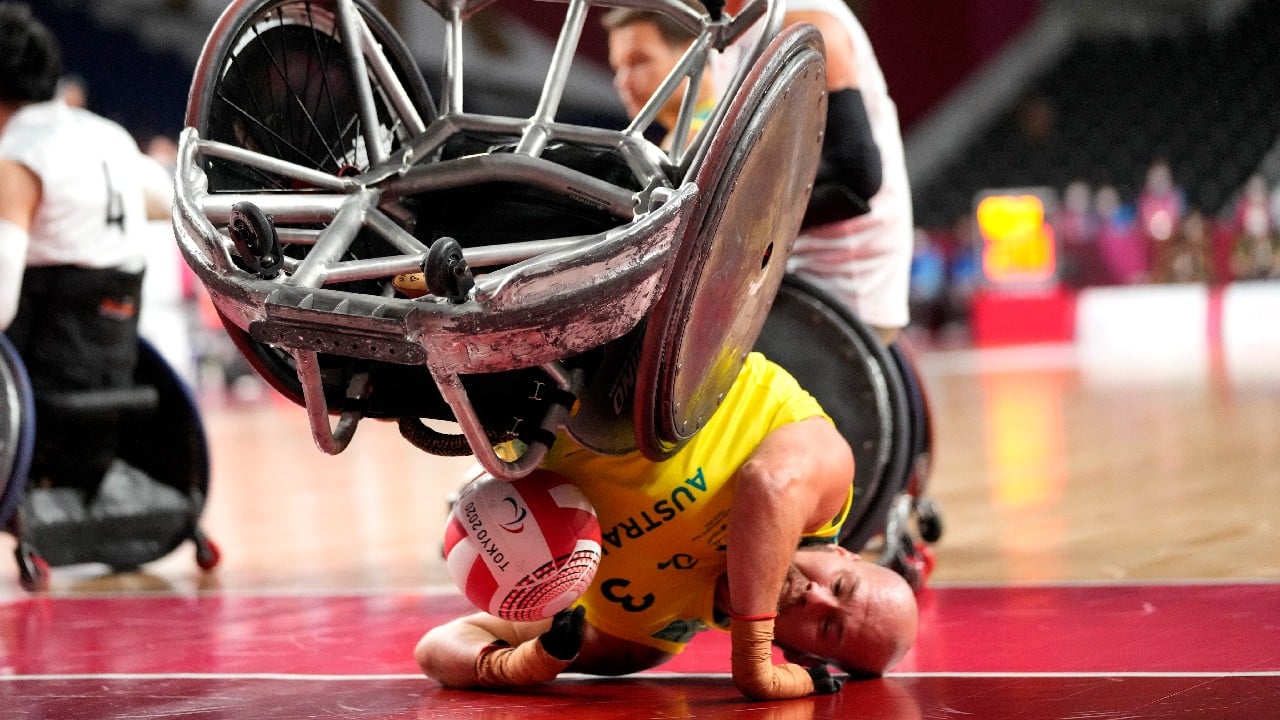 Disabled Person Silhouette With Hand Lift On Wheelchair Have Sunset City  Background. International Disability Day Or Handicapped Sport Or Paralympics.  Challenge And Conquer Success And Health Concept. Stock Photo, Picture and  Royalty