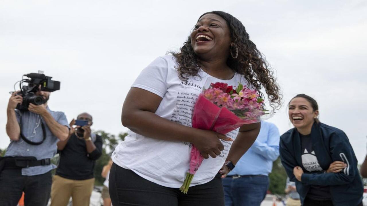 Rep. Cori Bush, D-Mo., speaks to crowds that attended a sit-in at Capitol Hill after it was announced that the Biden administration will enact a targeted nationwide eviction moratorium outside of Capitol Hill in Washington on Tuesday, August 3, 2021. For the past five days, lawmakers and activists primarily led by Rep. Cori Bush, D-Mo., have been sitting in on the steps of Capitol Hill to protest the expiration of the eviction moratorium. (Image: AP)