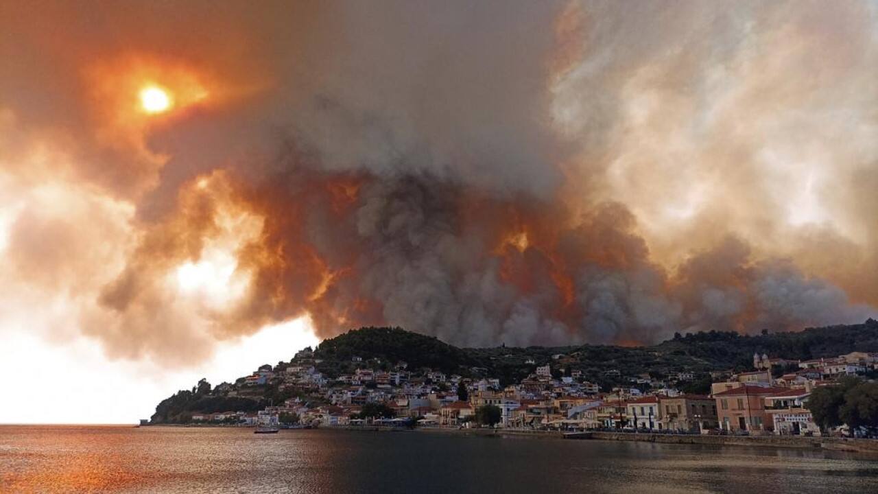 Flames burn on the mountain near Limni village on the island of Evia, about 160 kilometers (100 miles) north of Athens, Greece, Tuesday, Aug. 3, 2021. Greece Tuesday grappled with the worst heatwave in decades that strained the national power supply and fueled wildfires near Athens and elsewhere in southern Greece. As the heat wave scorching the eastern Mediterranean intensified, temperatures reached 42 degrees Celsius (107.6 Fahrenheit) in parts of the Greek capital. (Image: AP)