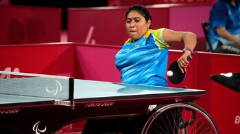 Sonalben Patel of India plays against Li Qian of China in Class 3, Group D of women's table tennis at the Tokyo 2020 Paralympic Games, August 25, in Tokyo, Japan. (Image: AP)