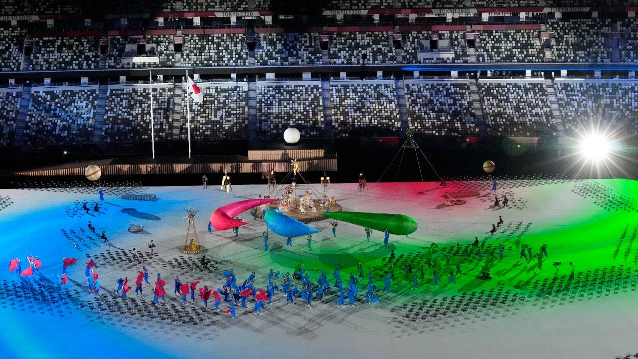 Japanese Emperor Naruhito got it all started again, this time under the theme “We Have Wings.” Among the few on hand were Douglas Emhoff, husband of U.S. Vice President Kamala Harris, International Paralympic Committee President Andrew Parsons and International Olympic President Thomas Bach. (Image: AP)