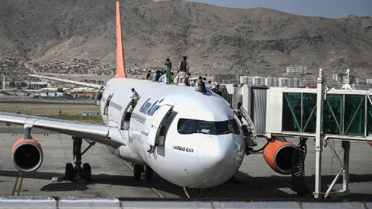 The bedlam at the airport came just hours after Taliban leaders ordered their fighters into Kabul to maintain order as Afghan President Ashraf Ghani fled the country. Many of the arrivals were fuelled by rumours spread on social media. (Image: AFP)