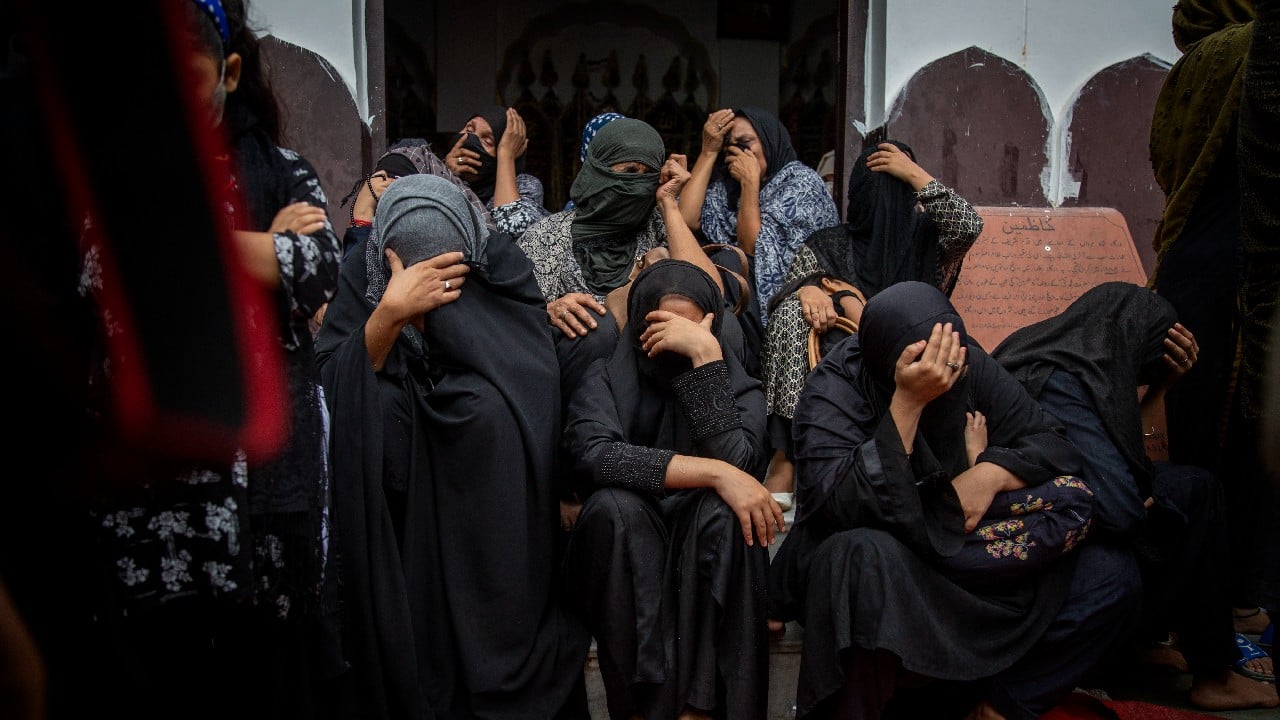 Shiite Muslims cry as they listen to a cleric narrating the battle of Karbala during Ashoura procession in New Delhi, India, August 20. Ashoura falls on the 10th day of Muharram, the first month of the Islamic calendar, when Shiites mark the death of Hussein, the grandson of the Prophet Muhammad, at the Battle of Karbala in present-day Iraq in the 7th century. (Image: AP)
