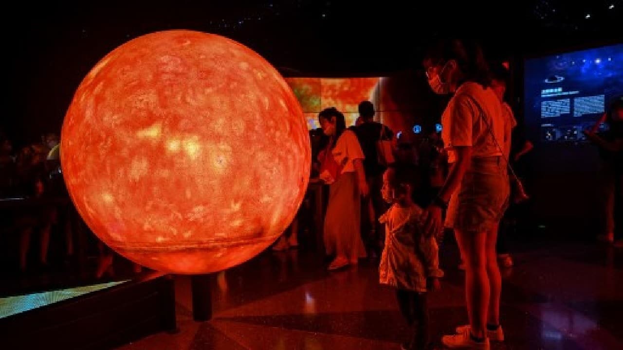 The planetarium features working telescopes and a range of interactive exhibits on the origins of the universe and history of astronomy, including Chinese-speaking versions of Copernicus and other luminaries explaining their theoretical breakthroughs. (Image: AFP)