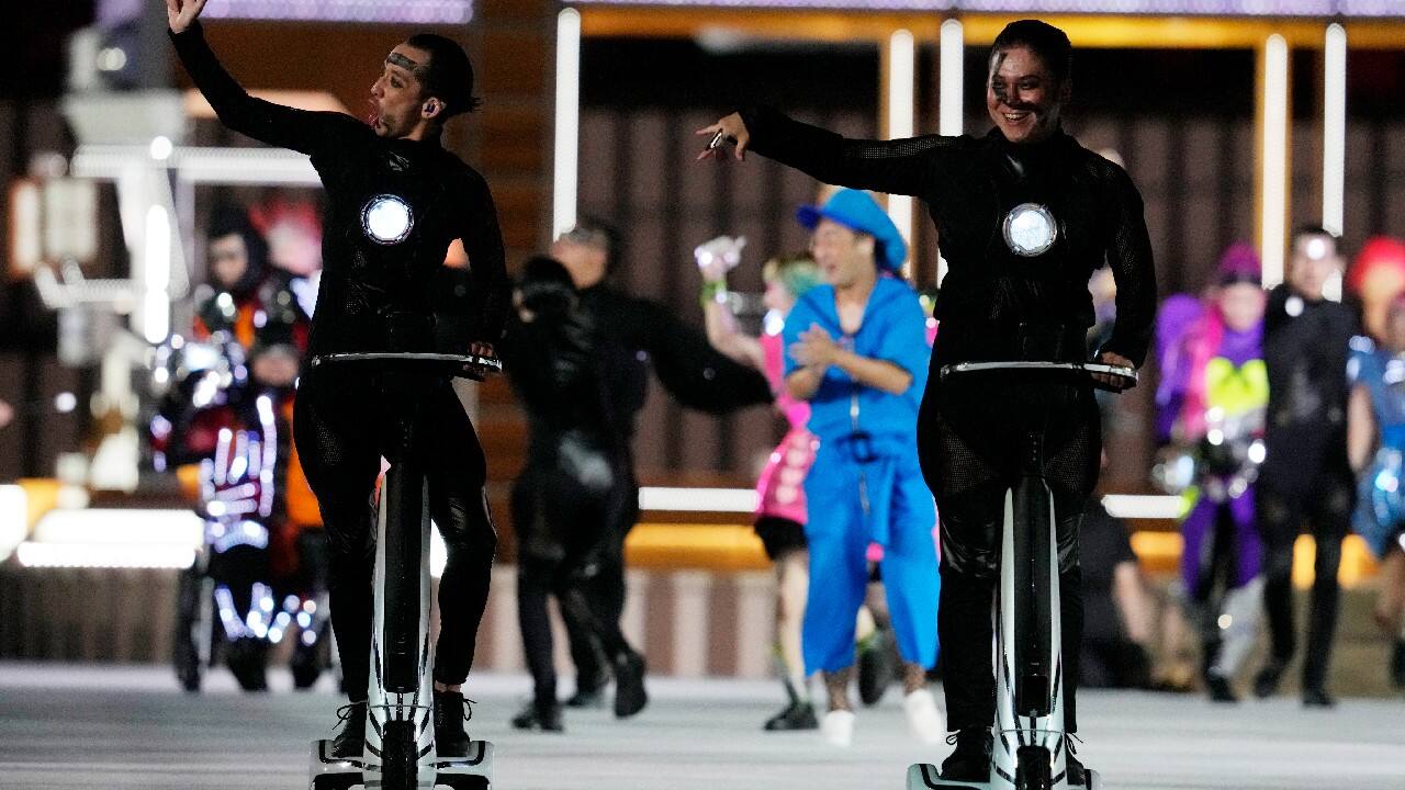 It was a circus-like opening with acrobats, clowns, vibrant music and fireworks atop the stadium to mark the the start of the long parade of athletes. The opening ceremony featured the national flags of the 162 delegations represented, which included the refugee team. In addition, the flag of Afghanistan was carried by a volunteer despite the delegation not being on hand in Tokyo. (Image: AP)