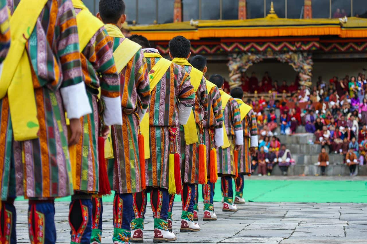 Performers get ready for a dance show at the Thimphu Tshechu festival in Bhutan.