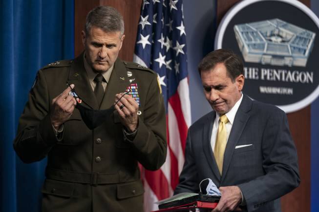 Pentagon spokesman John Kirby with U.S. Army Maj. Gen. William Taylor, Joint Staff Operations, conclude a briefing about the situation in Afghanistan at the Pentagon in Washington, Monday, Aug. 30, 2021. (AP Photo/Manuel Balce Ceneta)