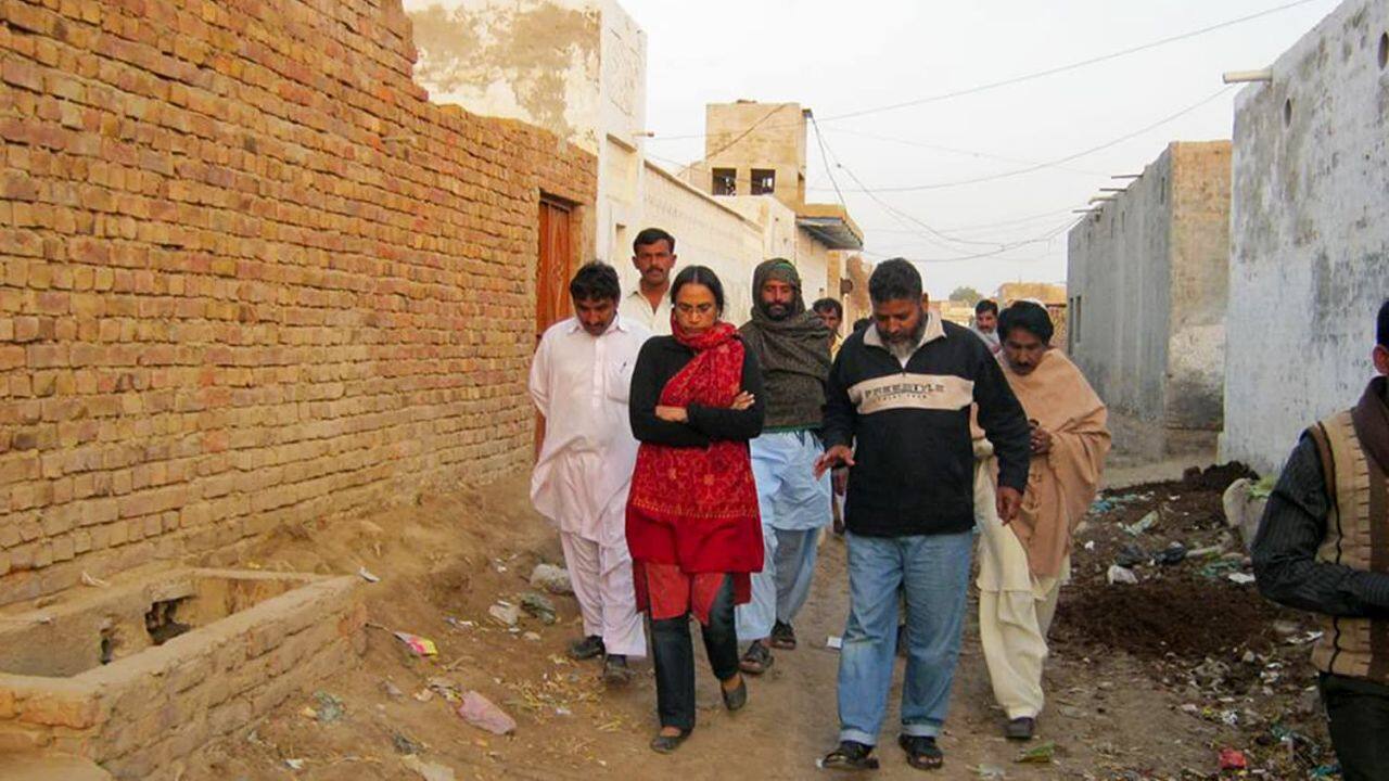 Pakistani activist Perween Rahman (in red) worked at a private architecture ﬁrm before being recruited by Dr Akhtar Hameed Khan to become Joint Director of the Orangi Pilot Project in 1982, where she managed the housing and sanitation programmes.