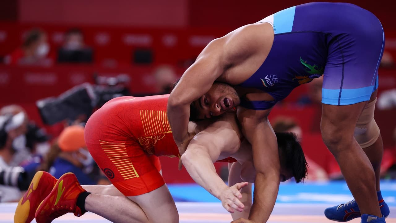Tokyo Olympics: India's Deepak Punia in action against Lin Zushen of China during the wrestling freestyle men's 86-kg quarter-final, at the Makuhari Messe Hall A, Japan, on August 4, 2021 (Image: Reuters/Leah Millis)