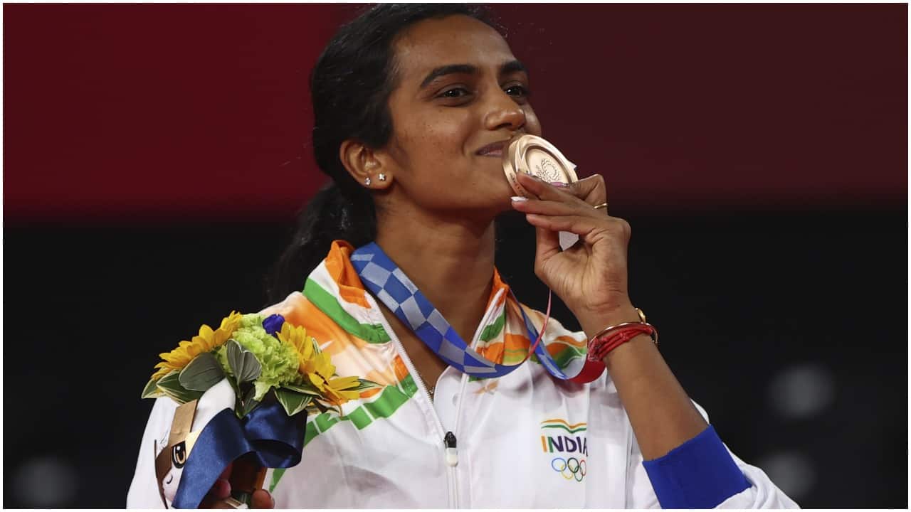 India shuttler PV Sindhu created history as the first woman and second athlete representing India to win two consecutive medals, following her win at the Tokyo 2020 Olympics. Image Source: Reuters