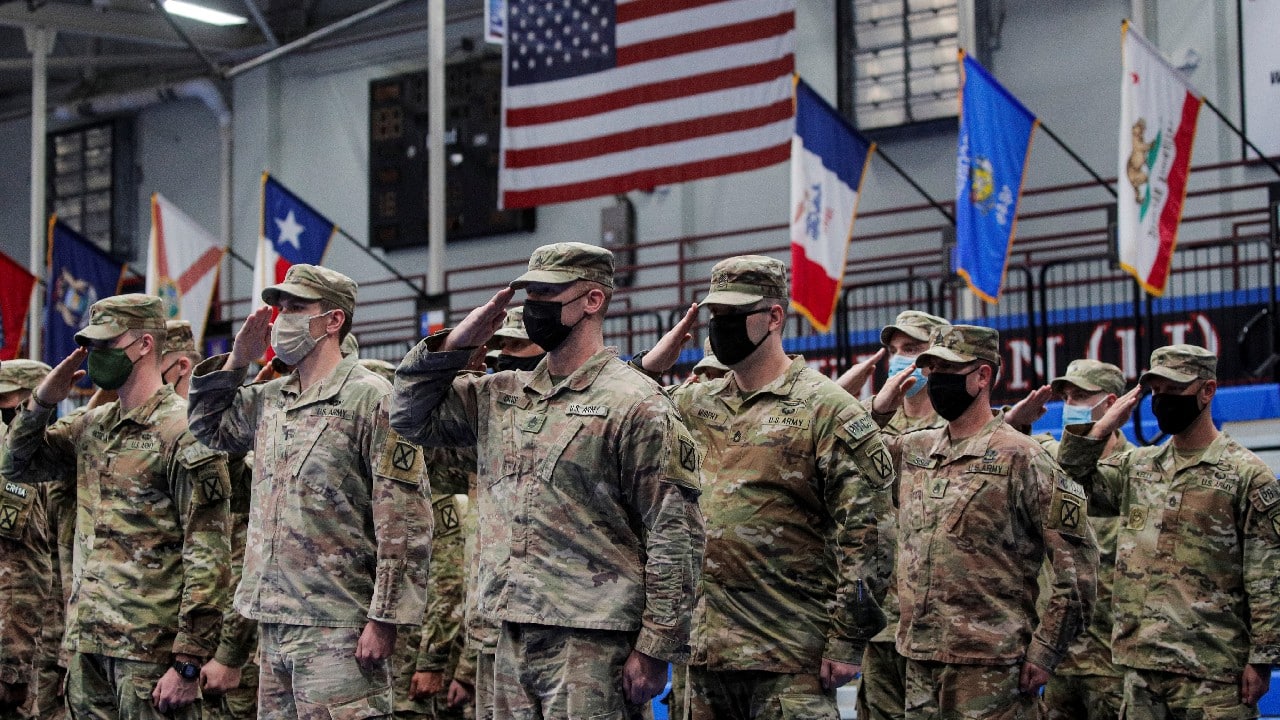 Soldiers from the 4th Battalion, 31st Infantry Regiment, 2nd Brigade Combat Team of the 10th Mountain Division, salute during the welcome ceremony after returning home from deployment in Afghanistan, at Fort Drum, New York, U.S., September 6. (Image: Reuters)