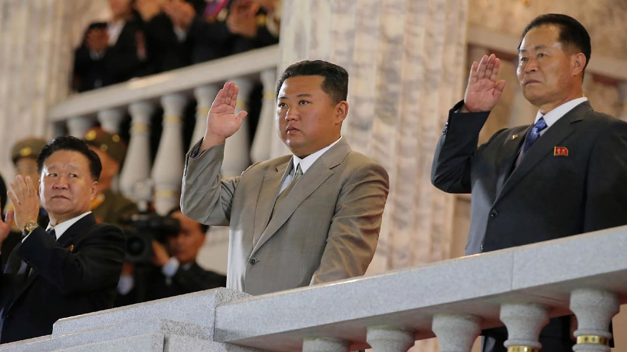 State media photos showed Kim — smiling widely and waving from a balcony toward troops and spectators at Kim Il Sung Square, which is named after his grandfather who founded the nation in 1948. But the reports didn’t say if Kim made a speech during the event. (Image: Korean Central News Agency/Korea News Service via AP)