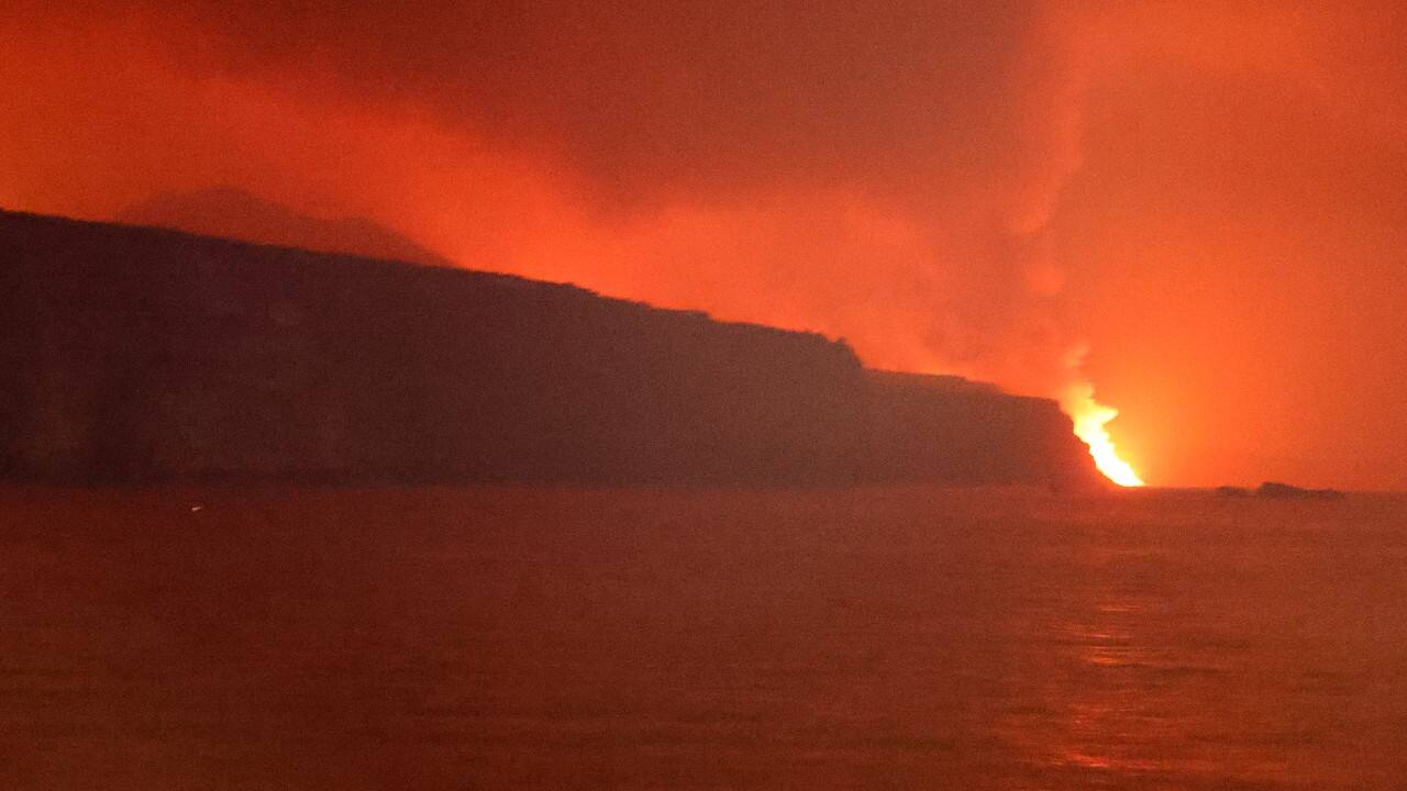 Lava flows into the sea as smoke rises following the eruption of a volcano, in the Port of Tazacorte, on the Canary Island of La Palma, Spain. (Image: Reuters) Lava flows into the sea as smoke rises following the eruption of a volcano, in the Port of Tazacorte, on the Canary Island of La Palma, Spain. (Image: Reuters)