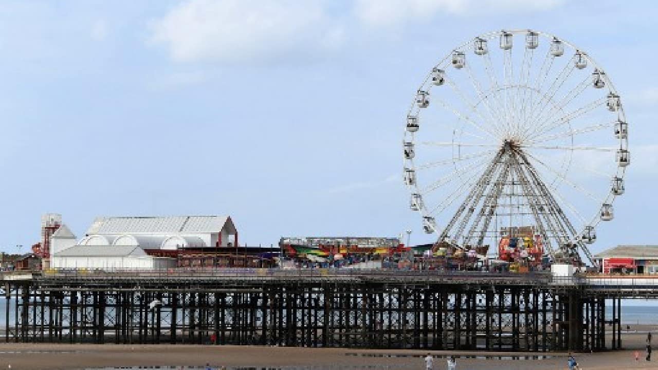 Blackpool, on the Irish Sea north of Liverpool and Manchester, embodies the rise and fall of the quintessential British seaside resort. (Image: AFP) , Domestic tourism boom gives UK seaside new lease of life amid COVID-19 blues, The World Live Breaking News Coverage & Updates IN ENGLISH