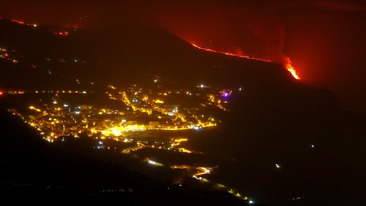 Lava flows into the sea near the town of Tazacorte, as seen from Tijarafe, following the eruption of a volcano on the Canary Island of La Palma, Spain. (Image: Reuters) Lava flows into the sea near the town of Tazacorte, as seen from Tijarafe, following the eruption of a volcano on the Canary Island of La Palma, Spain. (Image: Reuters)