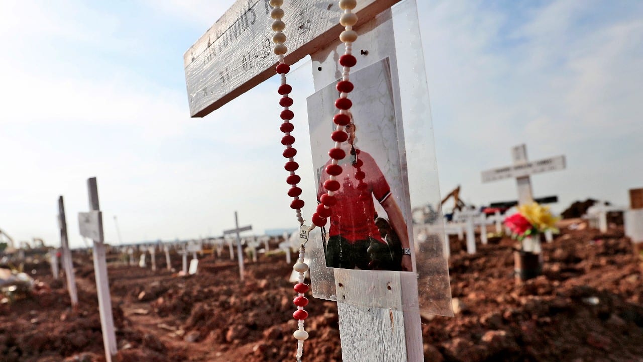 The Jakarta government cleared and dedicated land at Rorotan Cemetery for victims of the virus in March. By June, there were more than 50,000 confirmed COVID-19 deaths in the country. That grim total surged to over 100,000 on August 4. (Image: AP) The Jakarta government cleared and dedicated land at Rorotan Cemetery for victims of the virus in March. By June, there were more than 50,000 confirmed COVID-19 deaths in the country. That grim total surged to over 100,000 on August 4. (Image: AP)