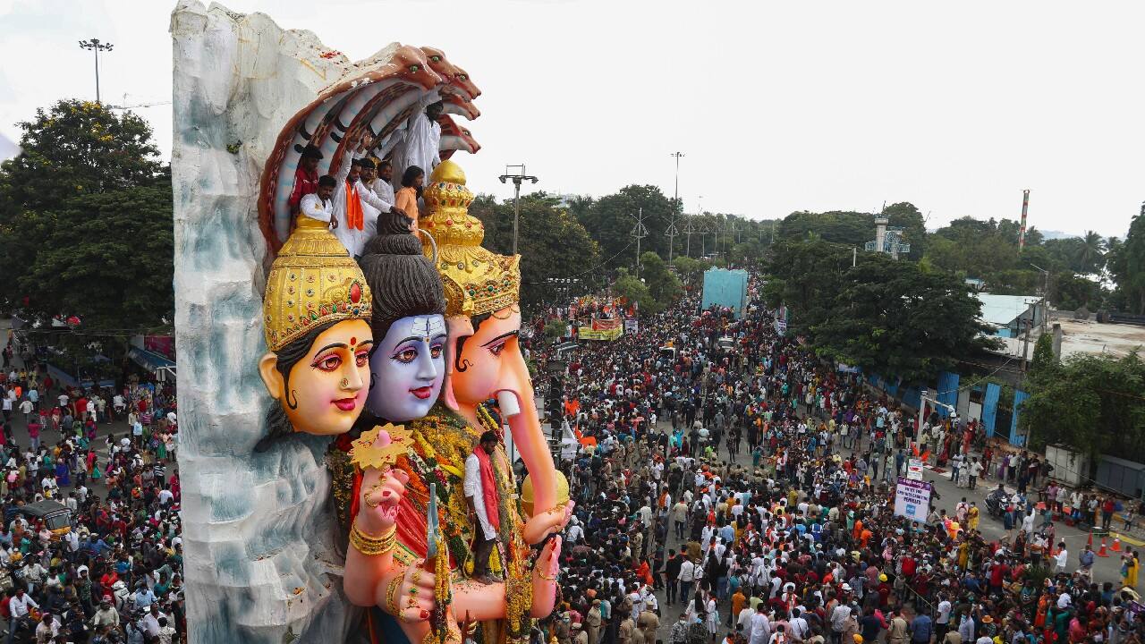 A giant idol of elephant-headed Hindu god Ganesha is taken in a procession for immersion in the Hussain Sagar Lake on the final day of Ganesh Chaturthi festival in Hyderabad, India. (Image: AP)