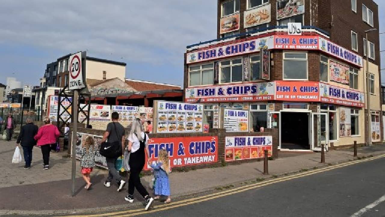 Owen Wells, a flamboyantly dressed welder, plumped for Blackpool instead of the hard-partying Spanish resort of Magaluf to celebrate his bachelor party. "With Covid, it's been awkward. A lot of my friends haven't been vaccinated. It's where we can go where we don't have to isolate for two weeks," he told AFP. (Image: AFP) , Domestic tourism boom gives UK seaside new lease of life amid COVID-19 blues, The World Live Breaking News Coverage & Updates IN ENGLISH