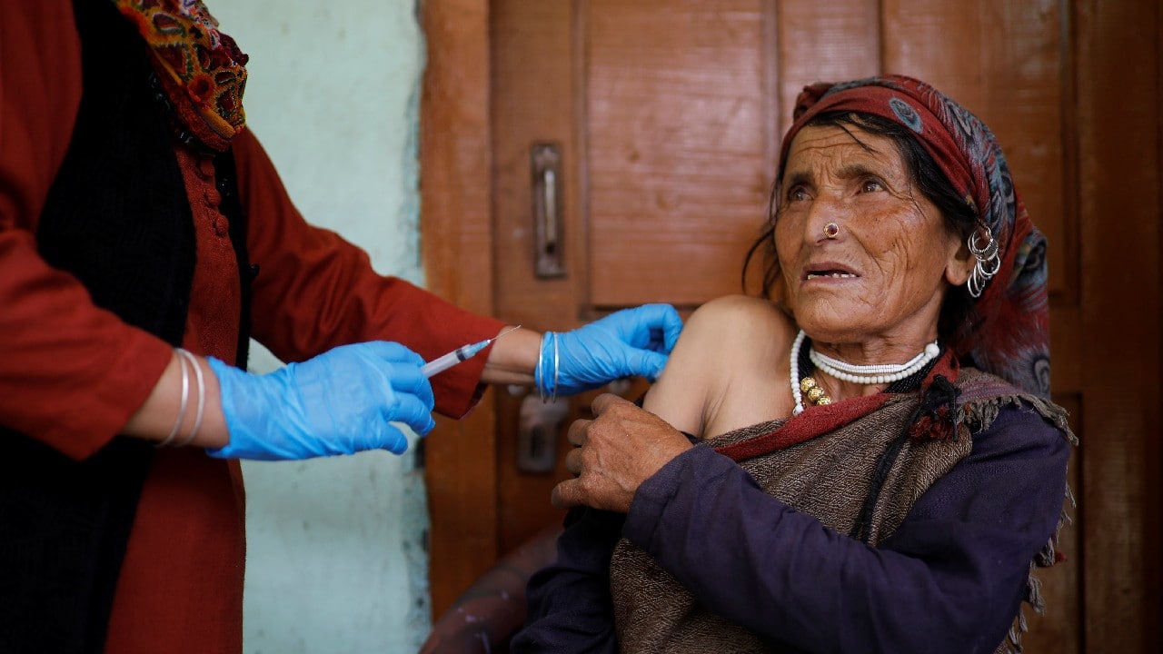 To visit the Indian village of Malana deep in the Himalayas, a COVID-19 vaccination team scrambled over a landslide that blocked the road the day before, scaled a retaining wall and then began a three-hour trek down and up a river valley. (Image: Reuters)