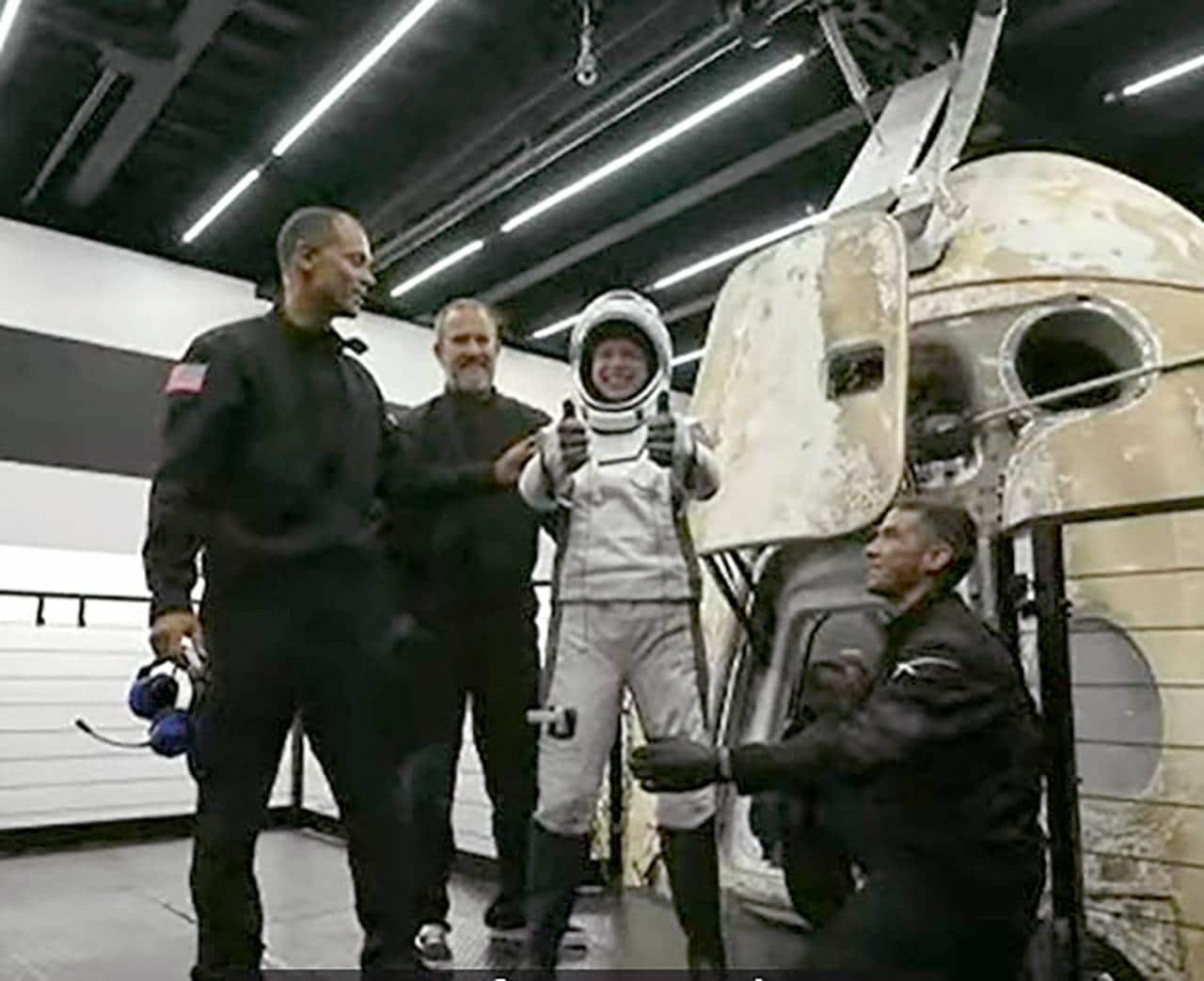 In this image taken from video, Hayley Arceneaux, one of four passengers aboard the SpaceX capsule, reacts after emerging from the capsule Saturday, Sept. 18, 2021, after it was recovered following its splashdown in the Atlantic off the Florida coast. The all-amateur crew was the first to circle the world without a professional astronaut. (Inspiration4 via AP) In this image taken from video, Hayley Arceneaux, one of four passengers aboard the SpaceX capsule, reacts after emerging from the capsule Saturday, Sept. 18, 2021, after it was recovered following its splashdown in the Atlantic off the Florida coast. The all-amateur crew was the first to circle the world without a professional astronaut. (Inspiration4 via AP)