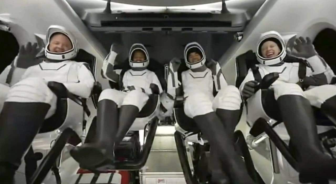 In this image taken from SpaceX video, passengers aboard a SpaceX capsule react as the capsule parachutes into the Atlantic Ocean off the Florida coast, Saturday, Sept. 18, 2021. The all-amateur crew was the first to circle the world without a professional astronaut. (SpaceX via AP) In this image taken from SpaceX video, passengers aboard a SpaceX capsule react as the capsule parachutes into the Atlantic Ocean off the Florida coast, Saturday, Sept. 18, 2021. The all-amateur crew was the first to circle the world without a professional astronaut. (SpaceX via AP)