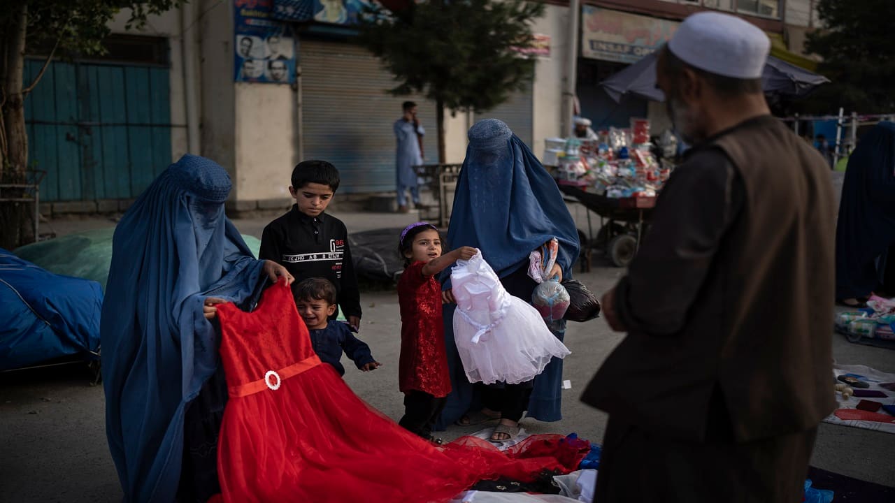 Many women seemed to stay off the streets in the days after the Aug. 15 takeover, but in the weeks since, more and more are appearing back in public, some in longer coats and headscarves, some in the all-covering burqa, which has been worn traditionally by many in Afghanistan regardless of the Taliban. (AP Photo/Felipe Dana)