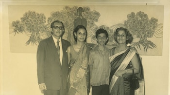 Phiroze Shroff, Pheroza Shroff, Cyrus Shroff and Mitha Shroff in front of a painting by B. Prabha at Cymroza Art Gallery, 1971.