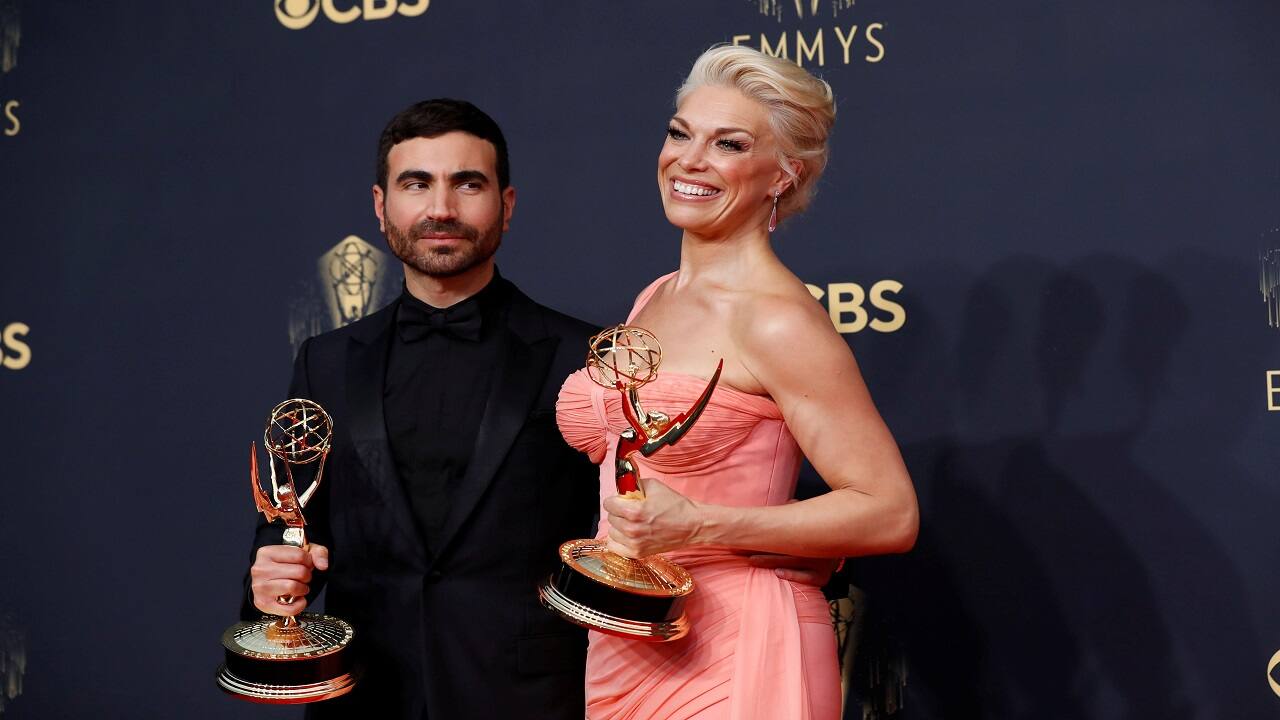73rd Primetime Emmy Awards - Show - Los Angeles, California, U.S., September 19, 2021. Brett Goldstein poses with his award for outstanding supporting actor in a comedy series for "Ted Lasso" next to Hannah Waddingham winner of award for outstanding supporting actress in a comedy series for "Ted Lasso" .REUTERS/Mario Anzuoni - RC2CTP94H6BD 73rd Primetime Emmy Awards - Show - Los Angeles, California, U.S., September 19, 2021. Brett Goldstein poses with his award for outstanding supporting actor in a comedy series for "Ted Lasso" next to Hannah Waddingham winner of award for outstanding supporting actress in a comedy series for "Ted Lasso" .REUTERS/Mario Anzuoni - RC2CTP94H6BD