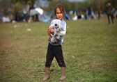 Children brave the cold in makeshift Bosnian camp