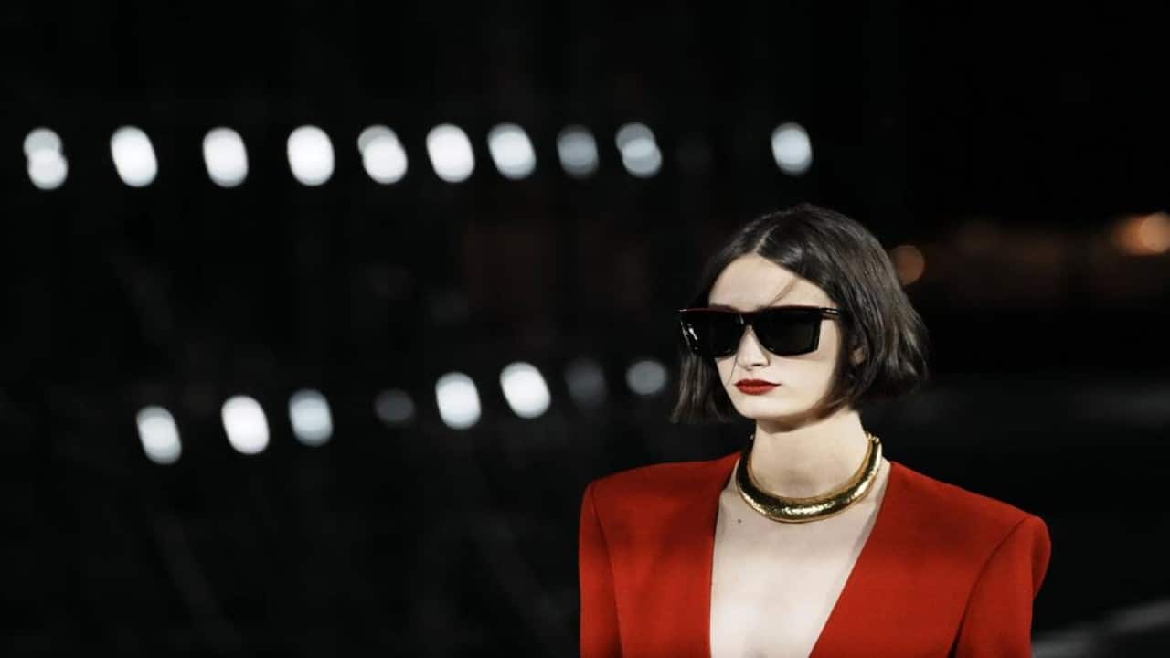A model wears a creation for Saint Laurent Spring-Summer 2022 ready-to-wear fashion show Tuesday, Sept. 28, 2021, in Paris. (AP Photo/Thibault Camus) A model wears a creation for Saint Laurent Spring-Summer 2022 ready-to-wear fashion show Tuesday, Sept. 28, 2021, in Paris. (AP Photo/Thibault Camus)