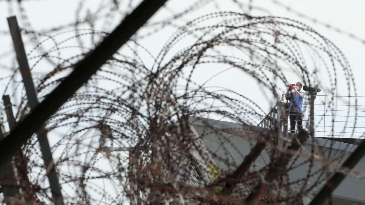 A visitor takes photos toward the North's side at the Imjingak Pavilion in Paju, near the border with North Korea, South Korea, September 24. North Korean leader Kim Jong Un's powerful sister, Kim Yo Jong, said Friday, North Korea is willing to resume talks with South Korea if it doesn't provoke the North with hostile policies and double standards. (Image: AP)
