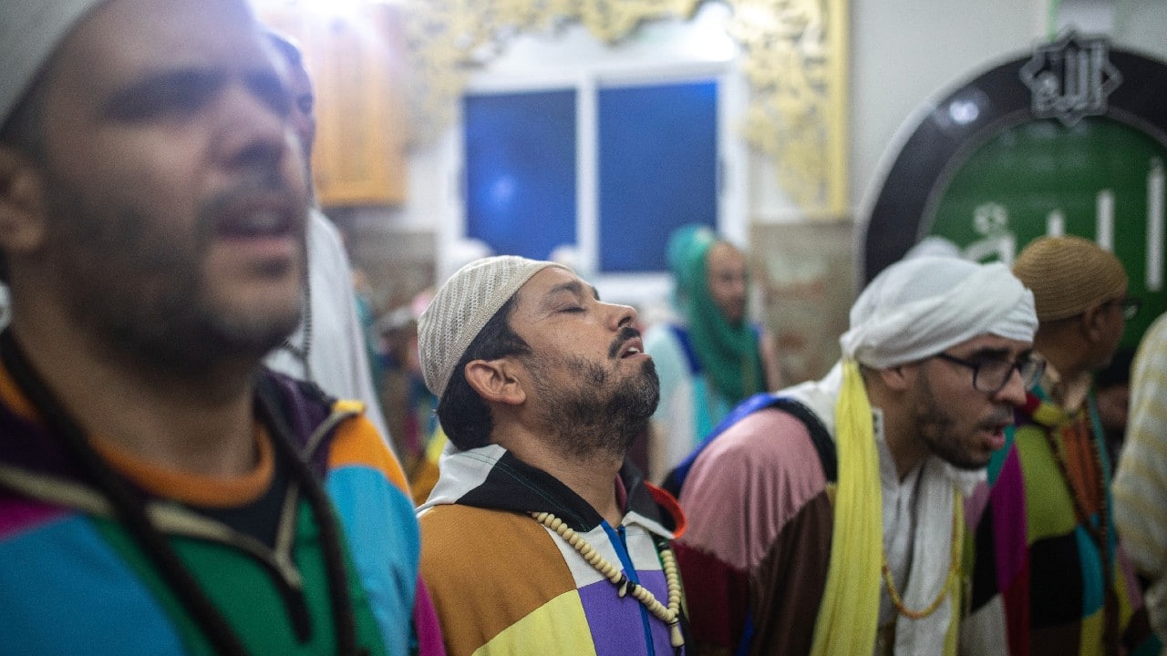 In the rituals, they surrounded their order’s leader and founder, Sheikh Mohamed Fawzi al Karkari, kissing his hand and pledging religious allegiance to him as they prayed and chanted. Later in the night, the faithful formed circles and danced in fervent movements that symbolize verses from the Quran according to believers. (Image: AP)