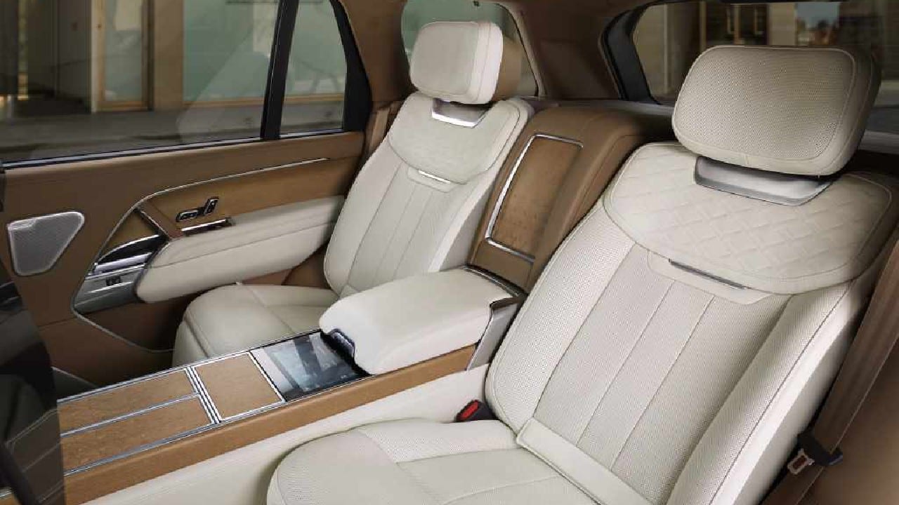 The rear passengers get 11.4-inch touchscreen mounted at the back of front seat headrests. The boot also gets a loading floor which can be used for camping expeditions, as it comes with cushions, backrest and speakers. (Image: Land Rover)